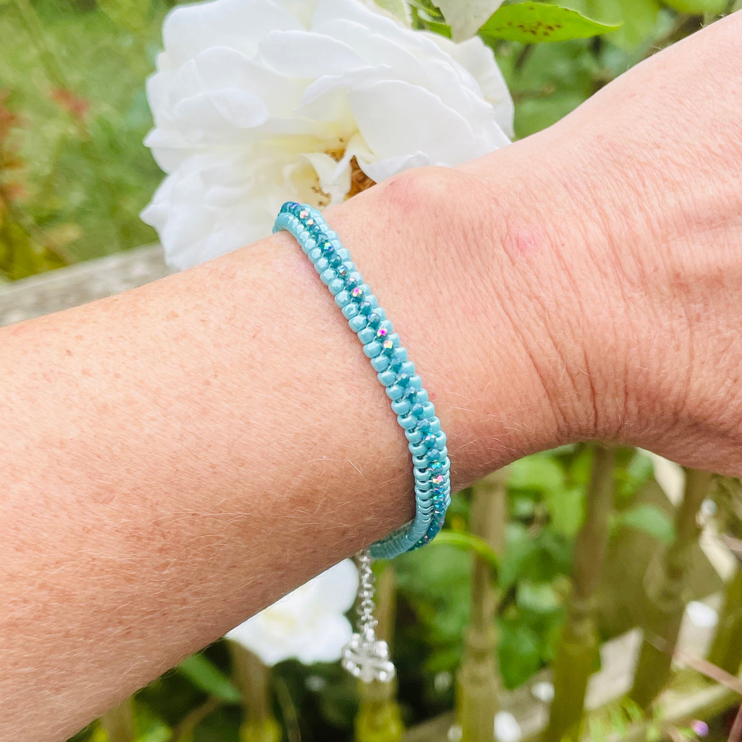 Seed bead and crystal bracelet on wrist