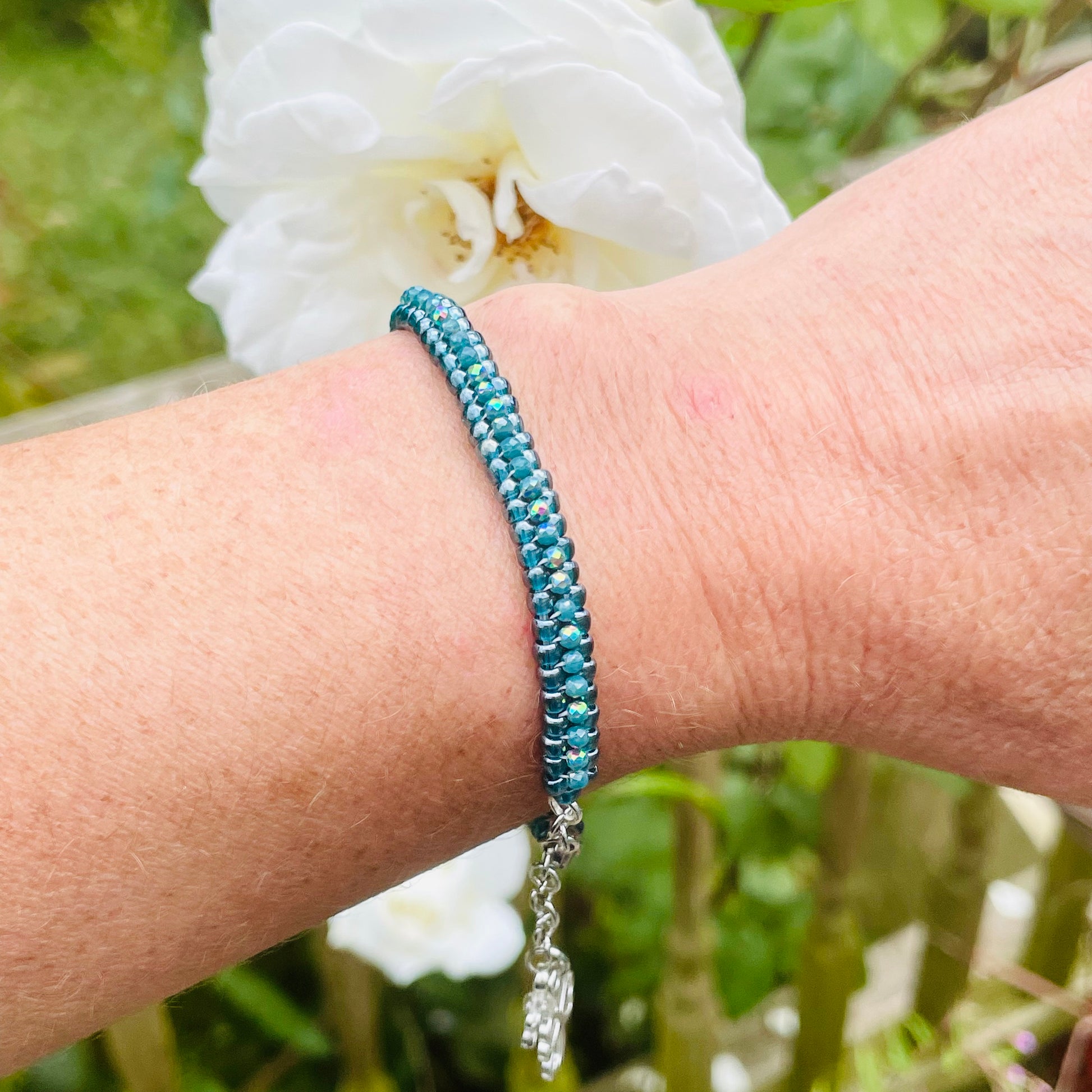 Seed bead and crystal bracelet on wrist