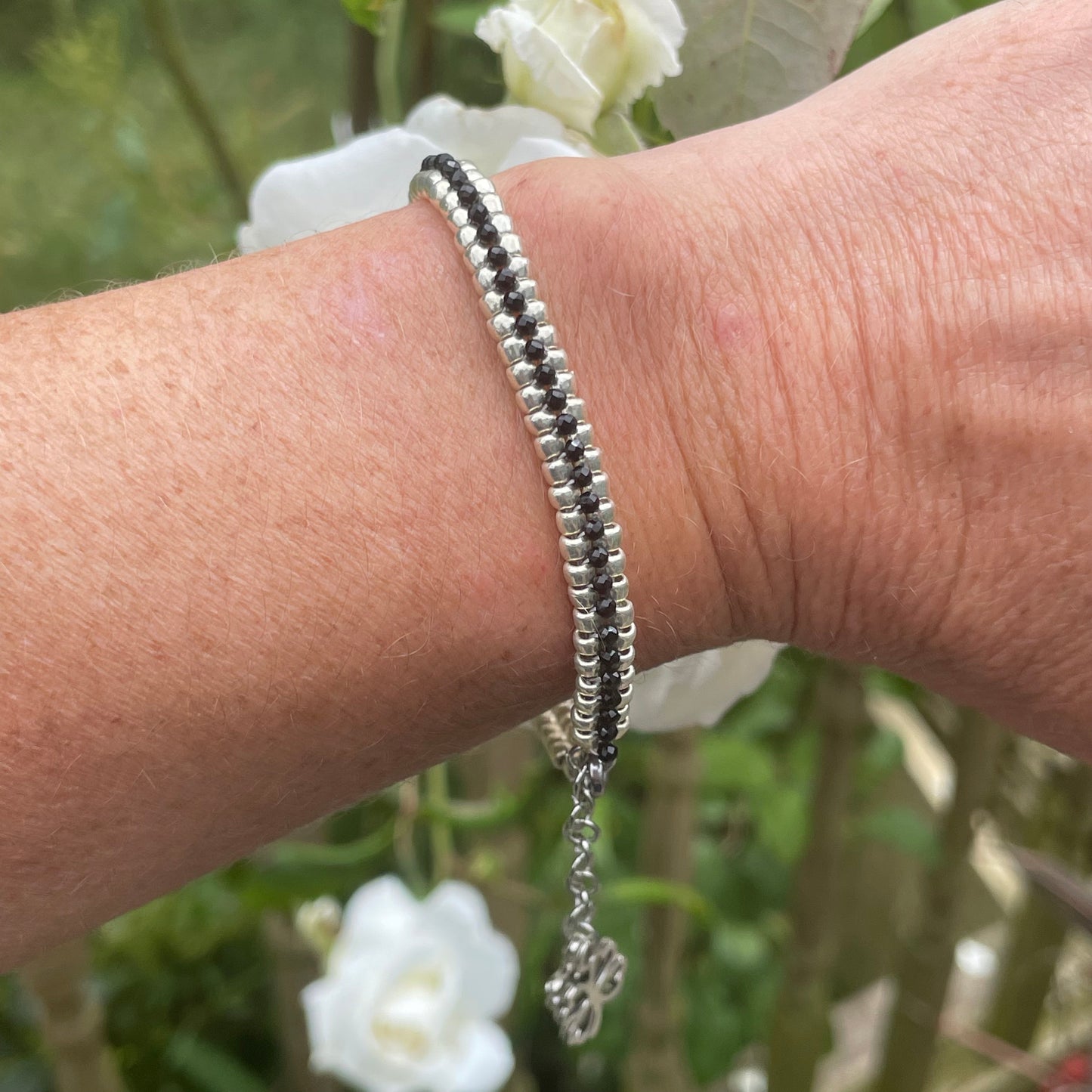 Seed bead and crystal bracelet on wrist