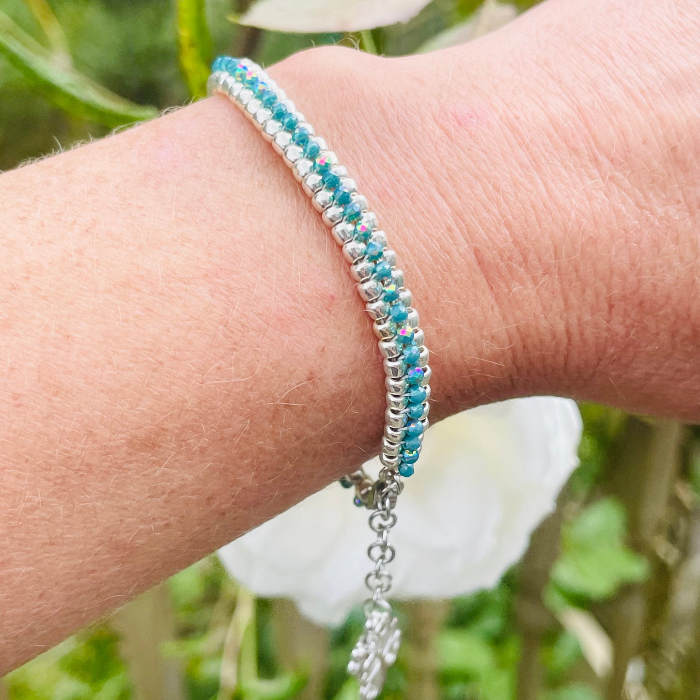 Seed bead and crystal bracelet on wrist