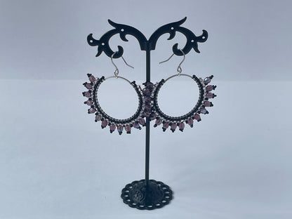 Image of earrings on a stand